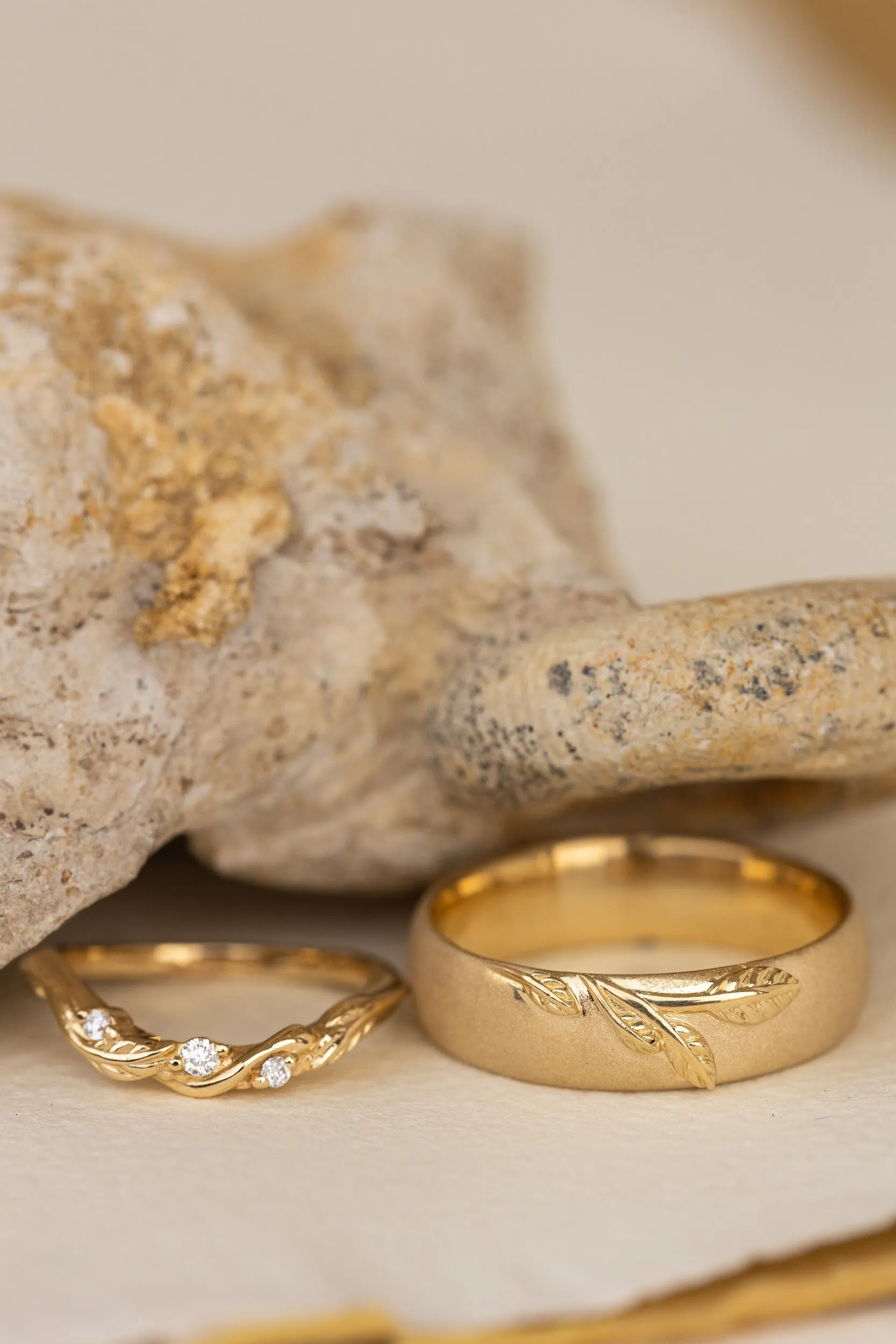 Wedding rings set for couples: satin band with branch for him, curved leaf ring with gemstones for her