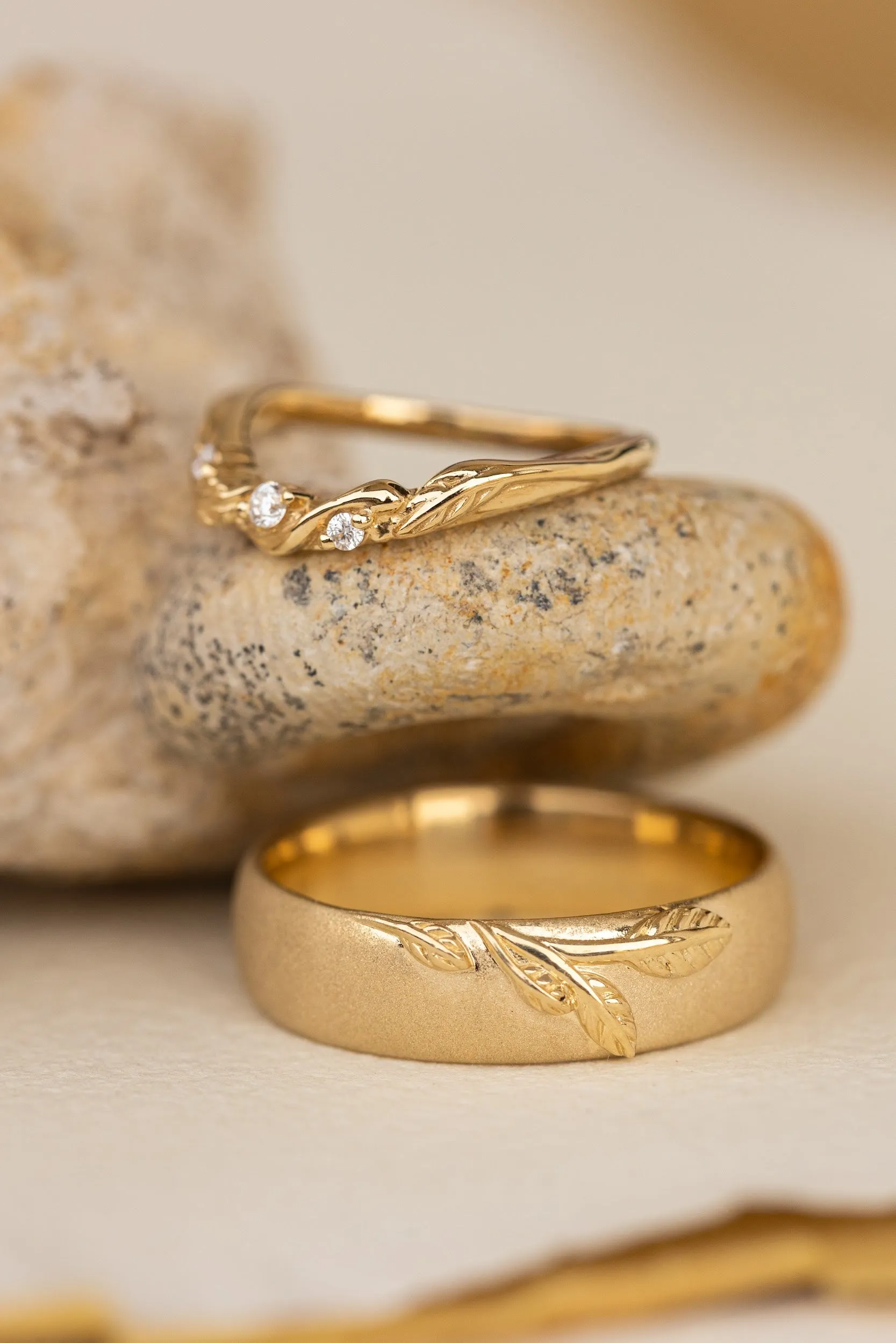 Wedding rings set for couples: satin band with branch for him, curved leaf ring with gemstones for her