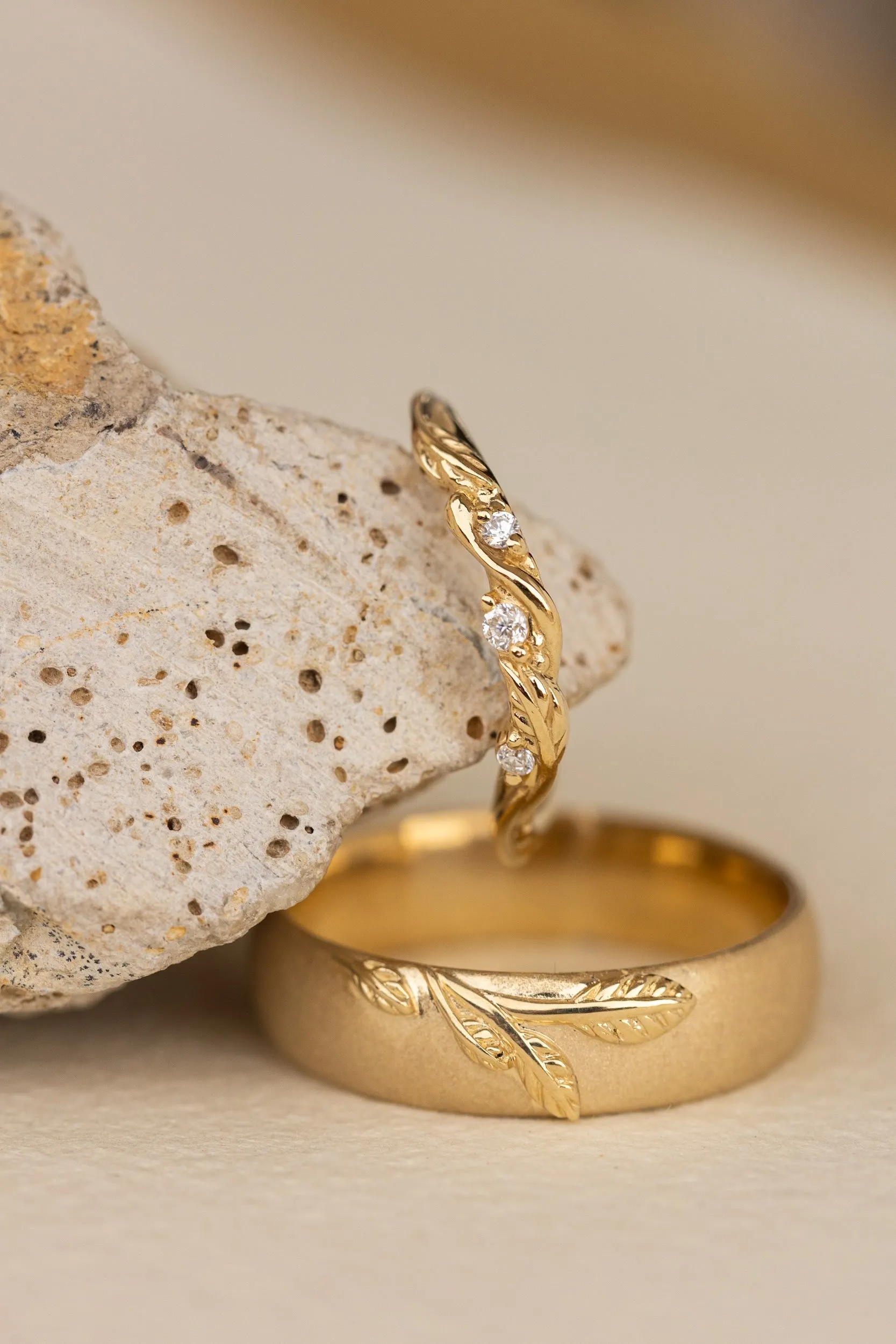 Wedding rings set for couples: satin band with branch for him, curved leaf ring with gemstones for her